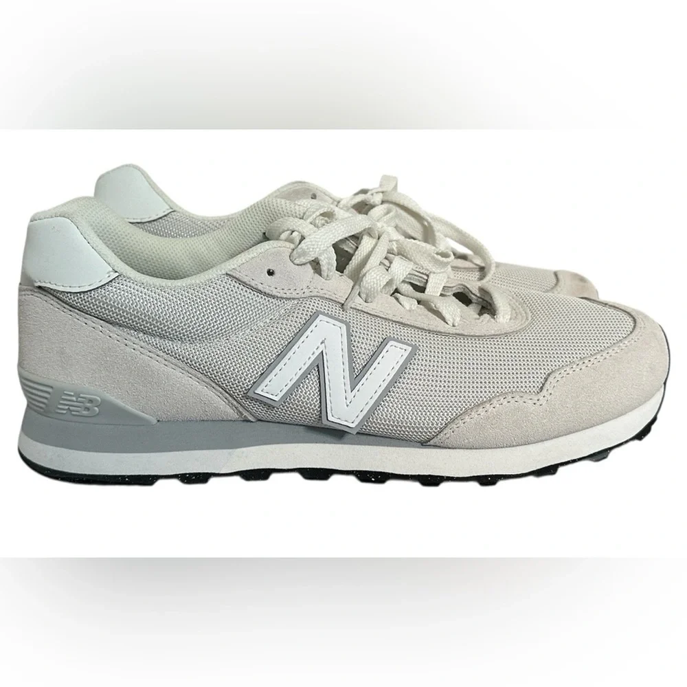 New Balance Grey / White athletic sneakers.